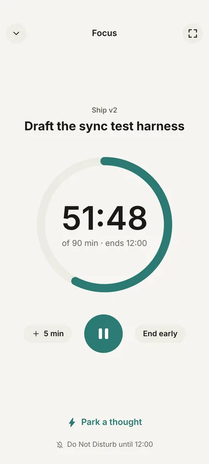 A focus block running: 51:48 left of 90 minutes, with pause, add five minutes, and “Park a thought”